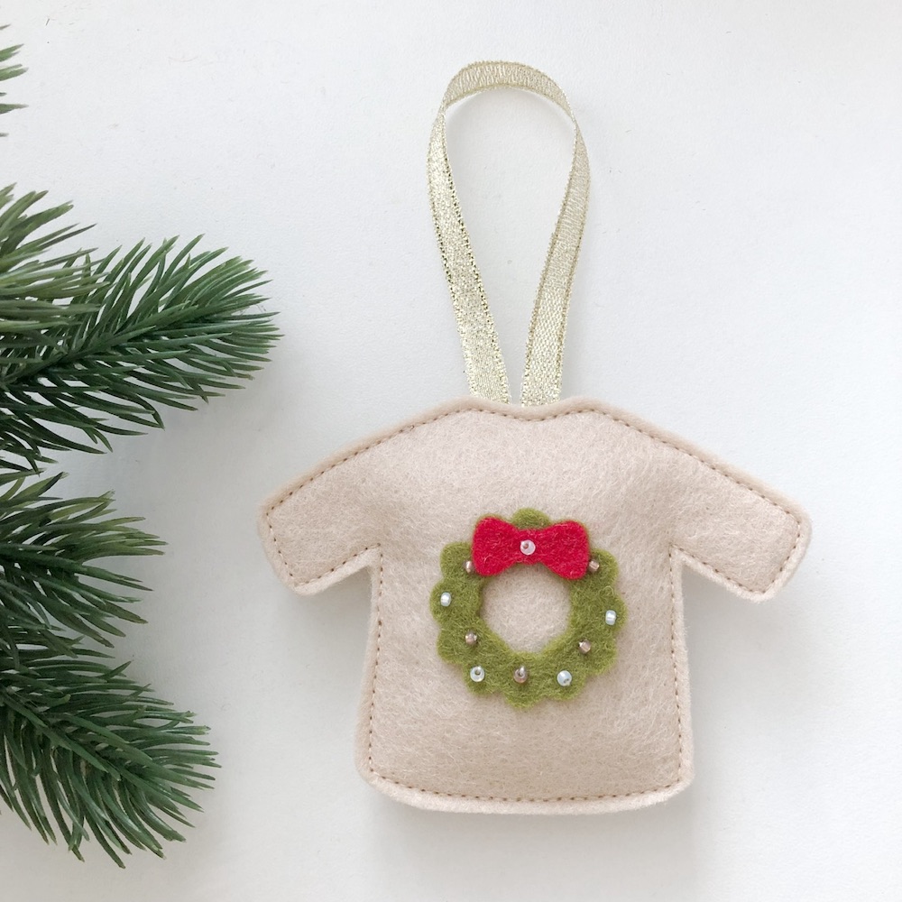 Foute Kersttrui krans creme