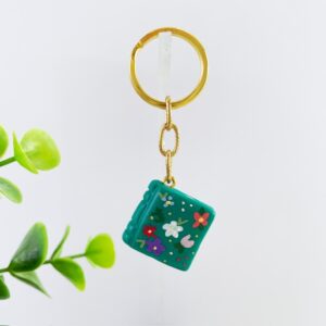 Sleutelhanger boek emerald bloemen