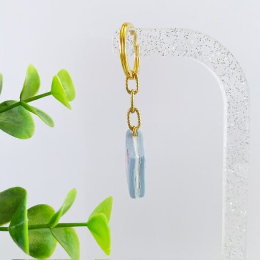 Sleutelhanger boek lichtblauw bloemen