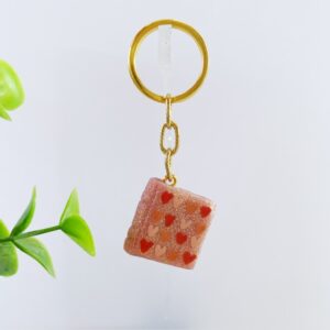 Sleutelhanger boek roze hartjes