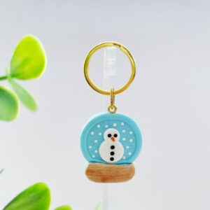Sleutelhanger snowglobe sneeuwpop